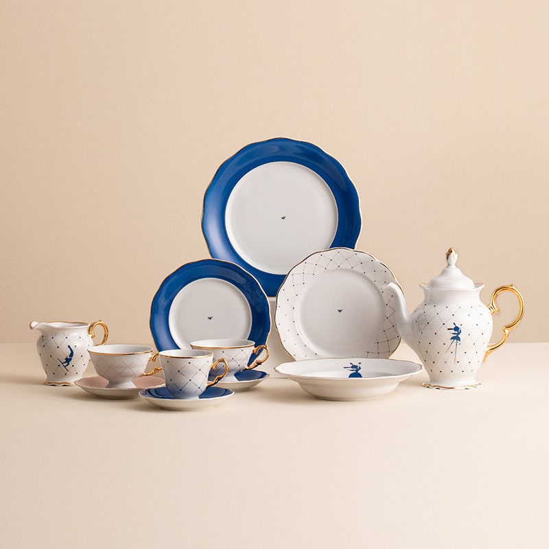 Elegant Kristoff Polish porcelain teacup and saucer with gold accents