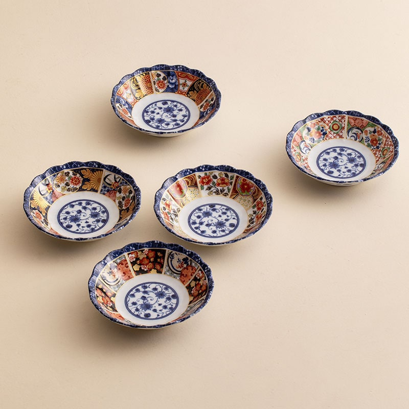 Japanese Mino ware red painted peony ceramic plate with scalloped edges.