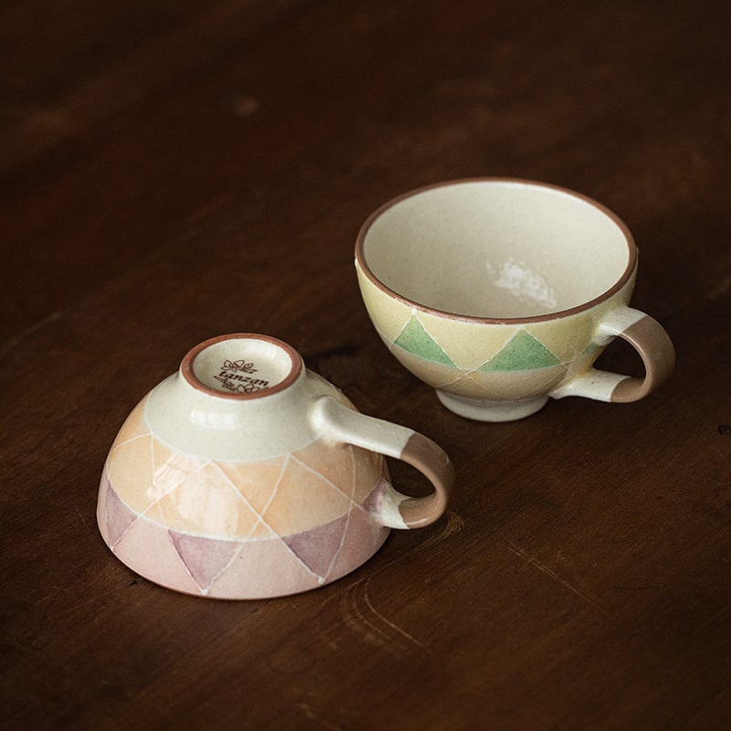 Close-up of Japanese hand-painted Mino Yaki coffee cup.
