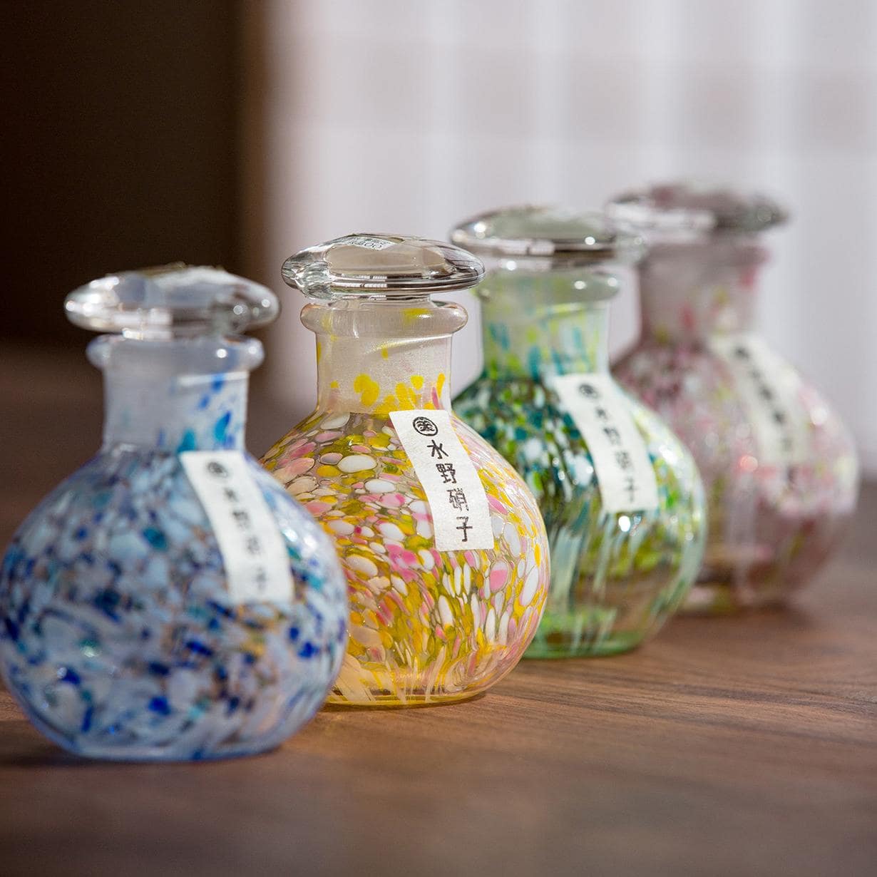Close-up of Japanese artistic seasoning bottle.