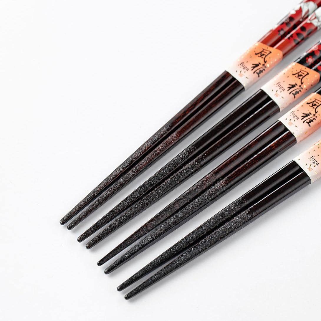 Japanese wooden chopstick set with cartoon and floral motifs