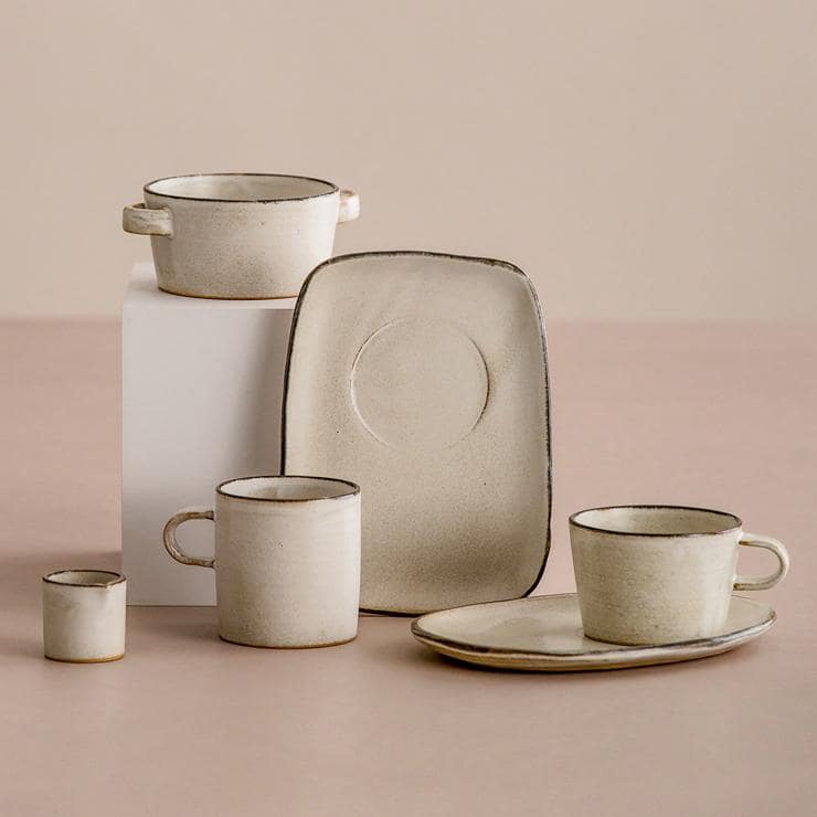 Handmade StudioM coffee cup and saucer with rustic white glaze