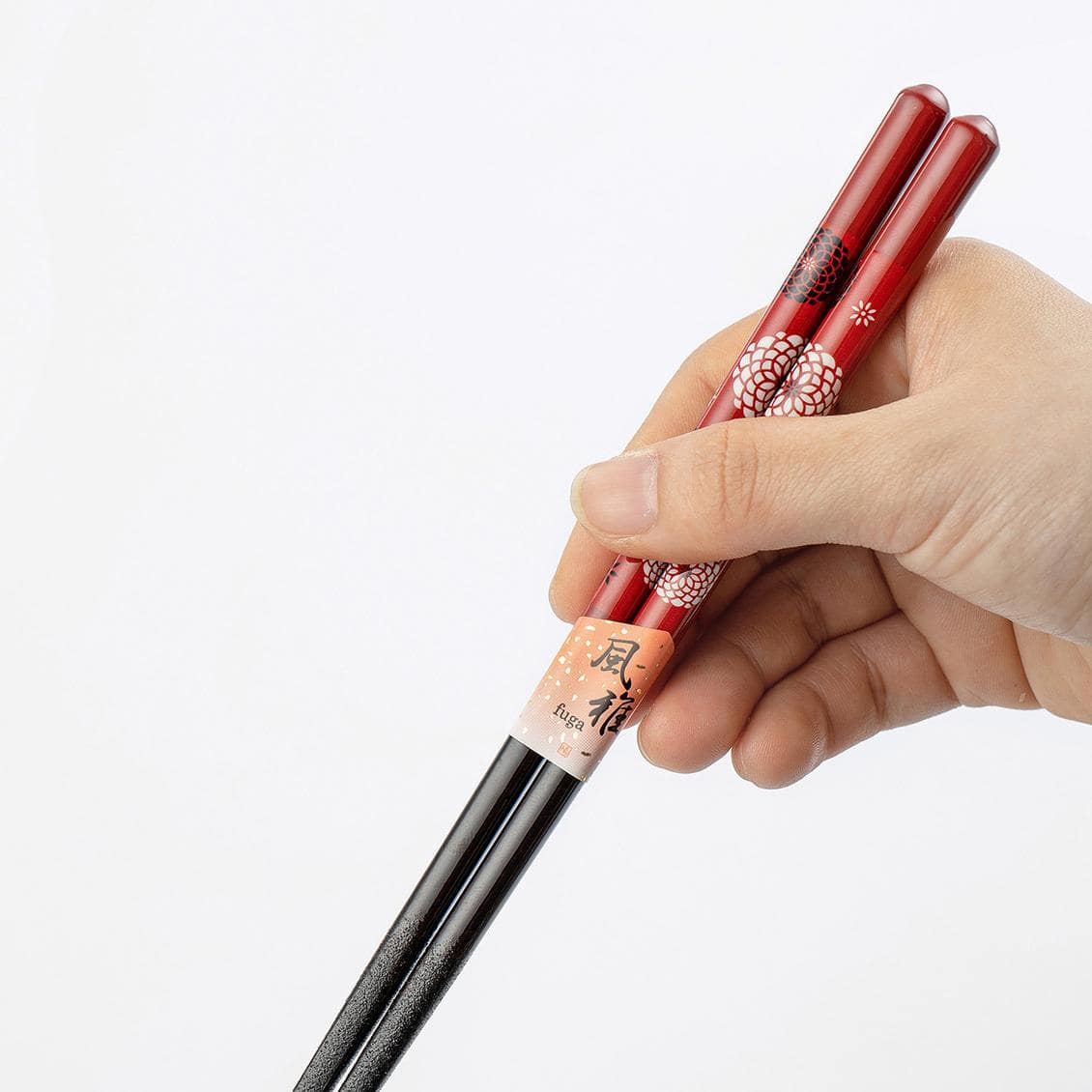 Elegant handmade chopsticks placed on a dining plate