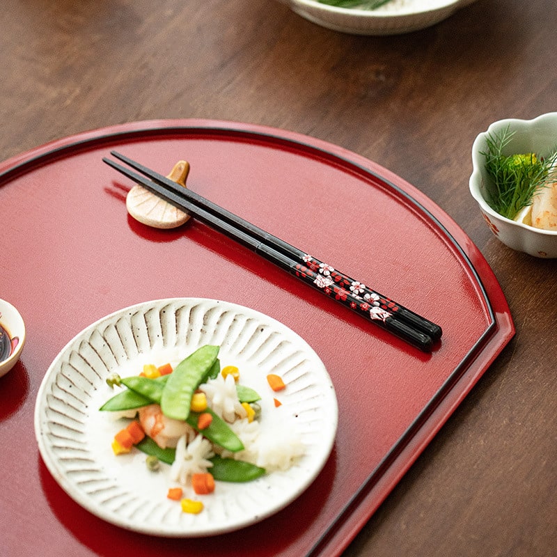 Japanese handmade couple chopsticks with floral designs on a table