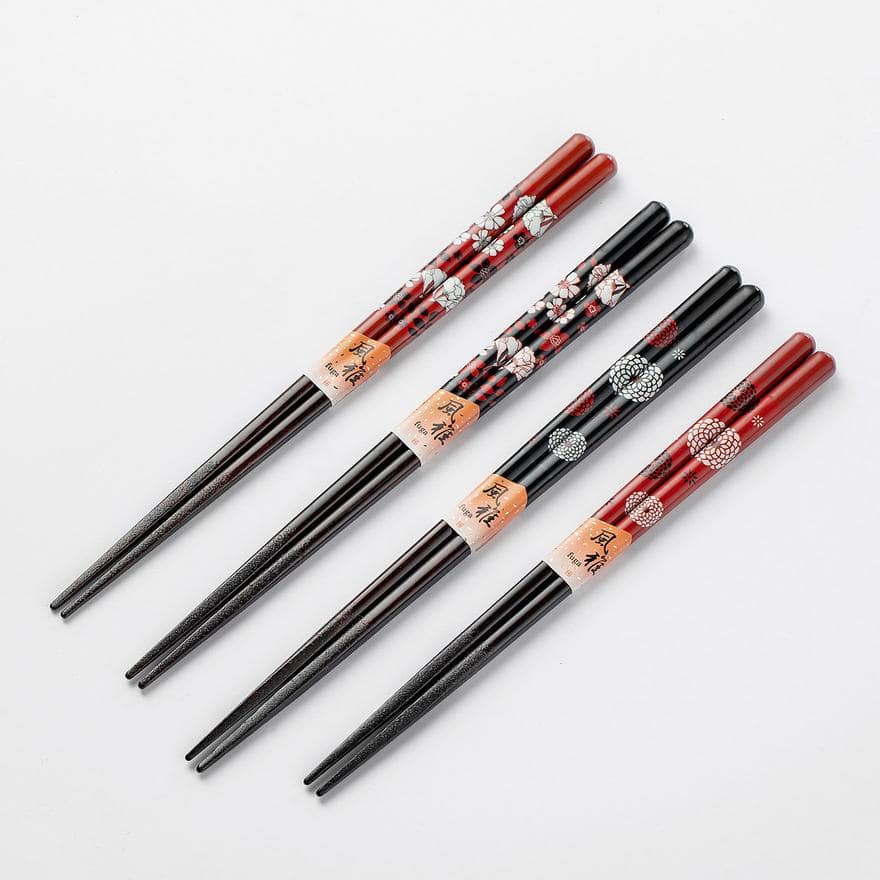 Japanese handmade couple chopsticks with floral designs on a table