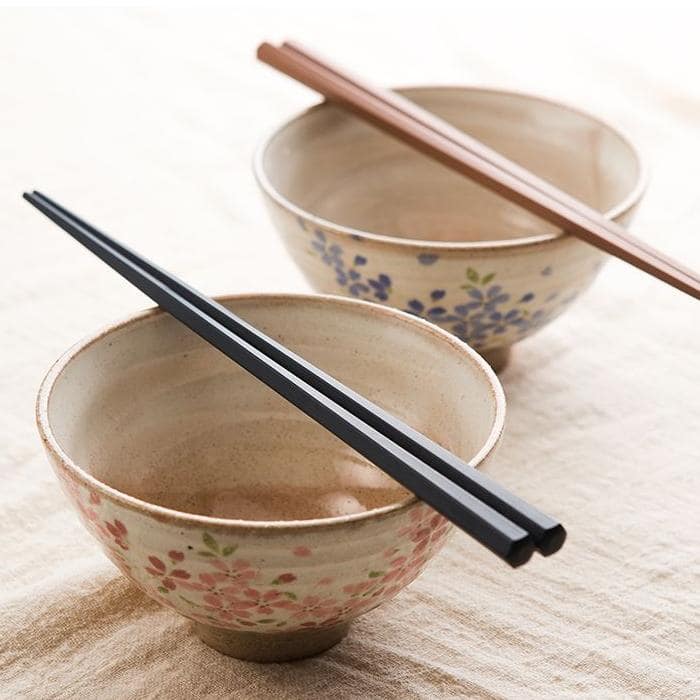 Close-up of non-slip Japanese wooden chopsticks on a dining table