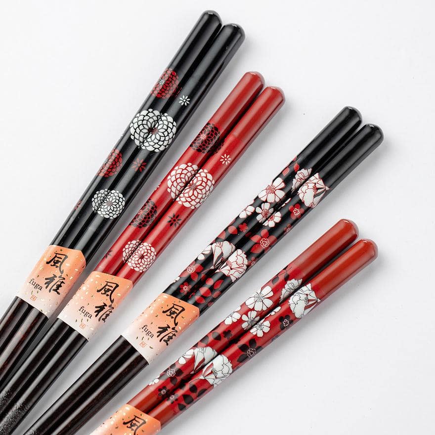 Japanese wooden chopstick set with cartoon and floral motifs