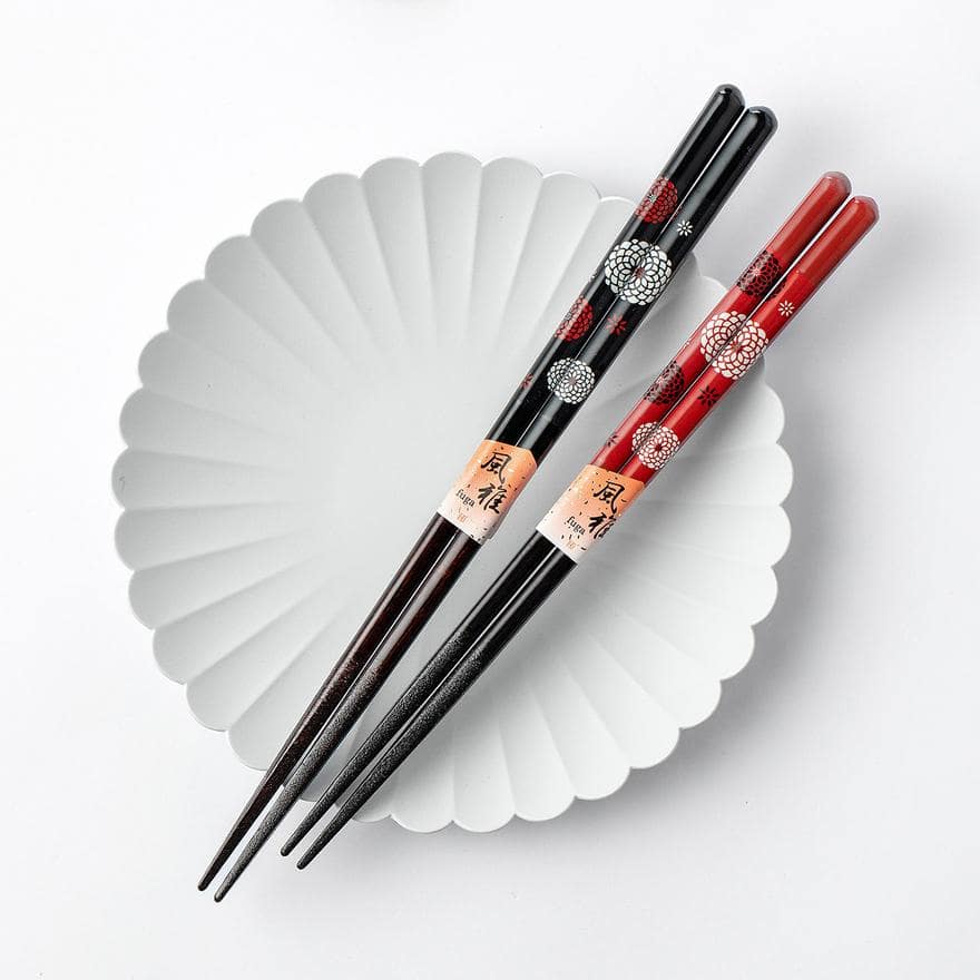 Elegant handmade chopsticks placed on a dining plate
