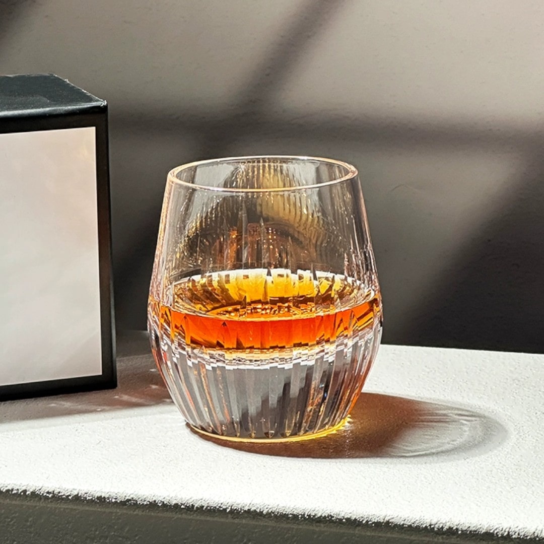 Handcrafted crystal glass for whiskey and brandy, featuring intricate cut design, 280mL capacity.