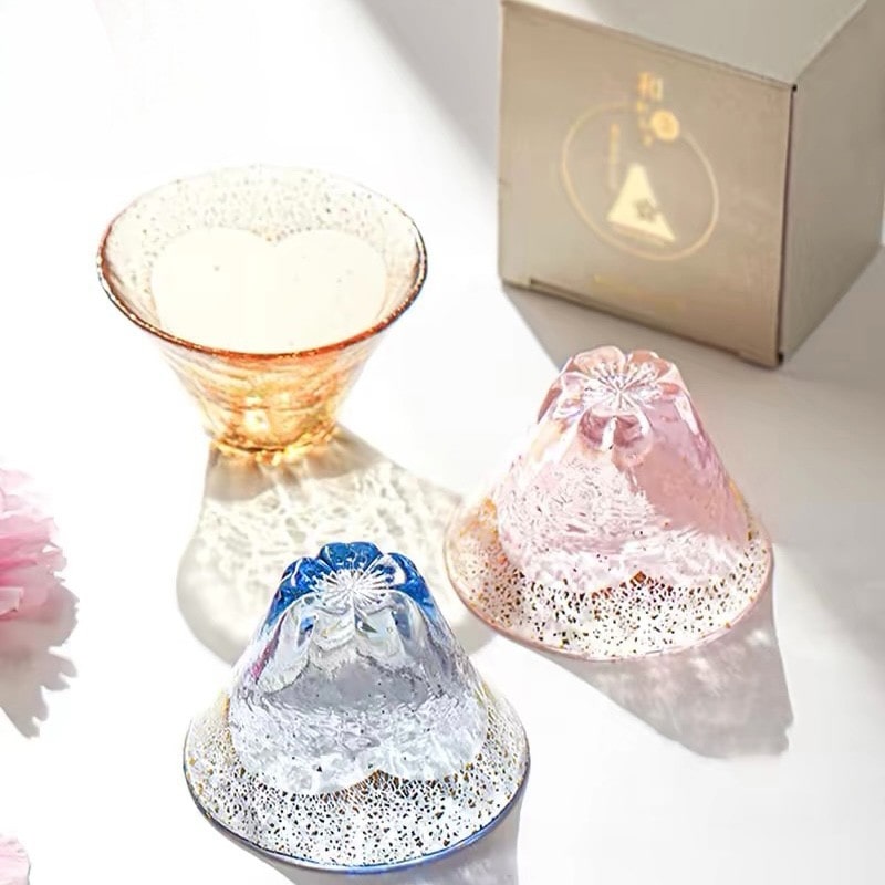 Multicolor Mount Fuji glass sake cups with shimmering gold flecks.