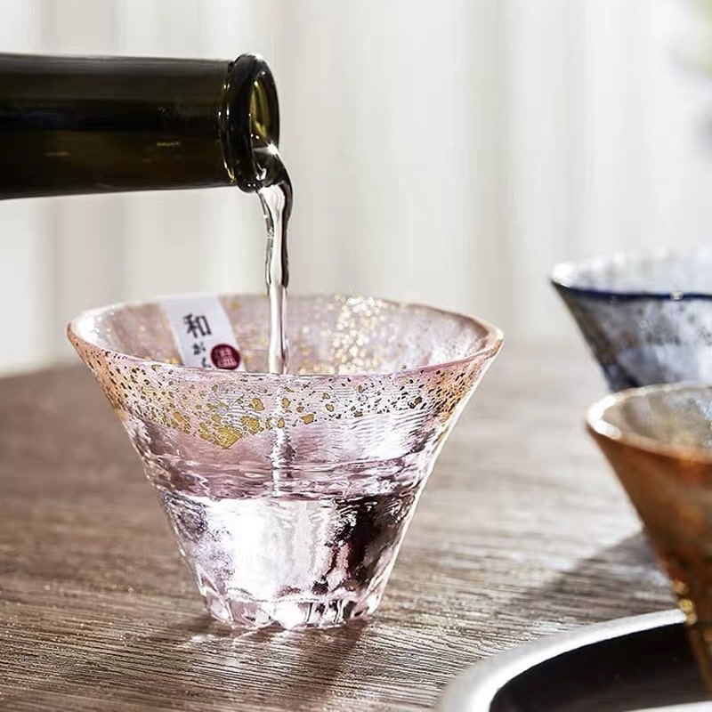 Multicolor Mount Fuji glass sake cups with shimmering gold flecks.