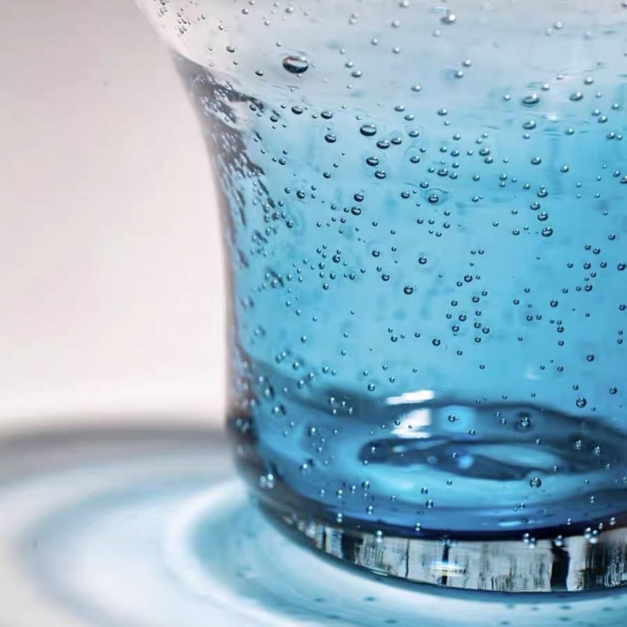 Artistic cocktail glass with a sleek design and handcrafted finish.