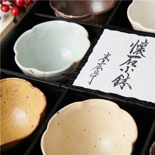 Unique artisan-crafted ceramic tea set for a serene tea experience.