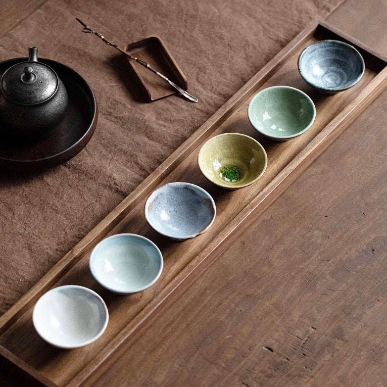 Six artisan tea cups with unique glazes and textures.