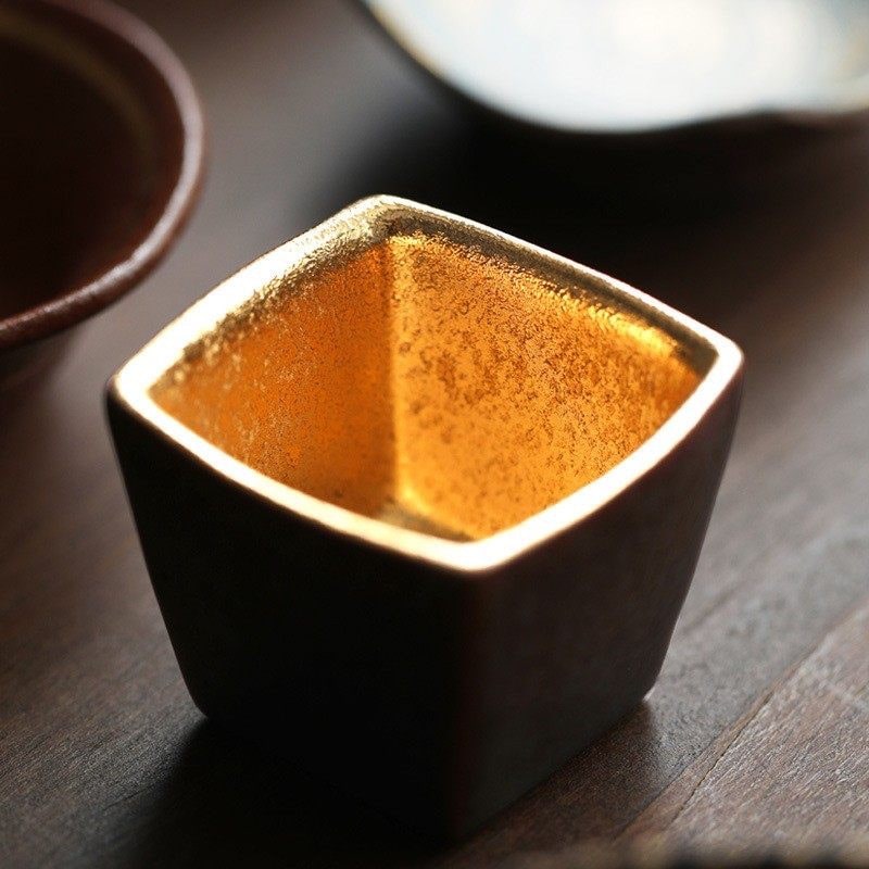 Premium ceramic sake cups with various designs and finishes.