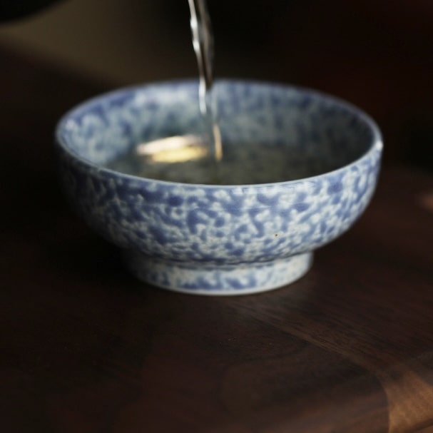 Premium ceramic sake cups with various designs and finishes.