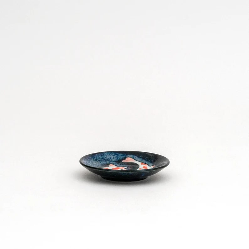 Koi fish-themed ceramic dinnerware set by AWASAKA.