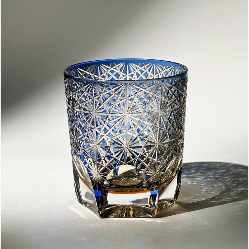 Blue daisy whiskey glass with Edo Kiriko crystal cut design in palace-inspired style.