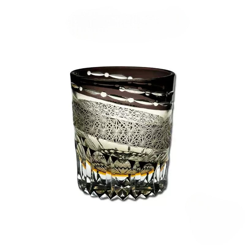 Handcrafted Edo Kiriko whiskey glass with shooting star pattern in crystal, double-layered for insulation.