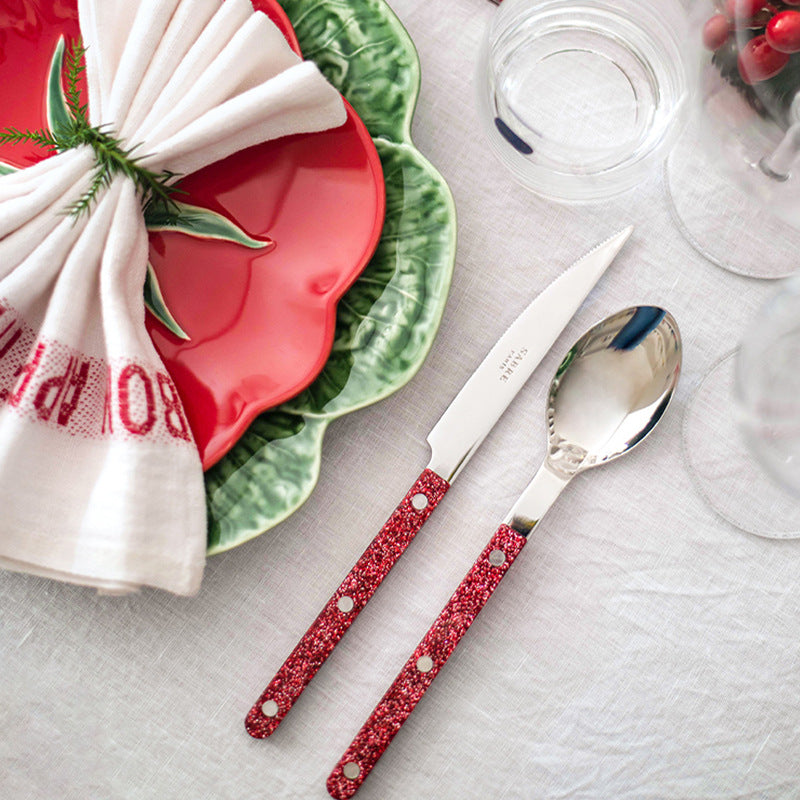 Sabre Paris luxury cutlery set with red glitter handles