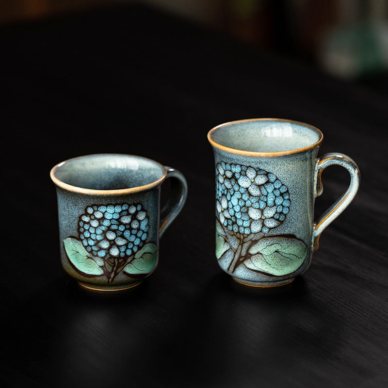 Handcrafted Nubiki-Yaki floral ceramic mug with hydrangea design