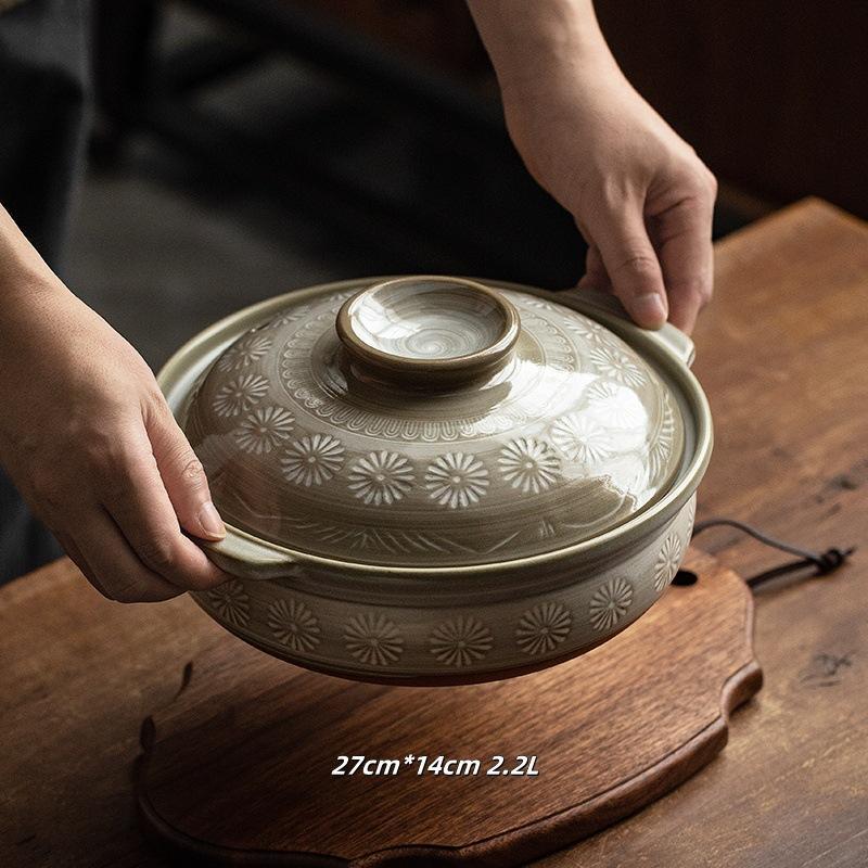 Japanese ceramic pots with embossed daisy patterns