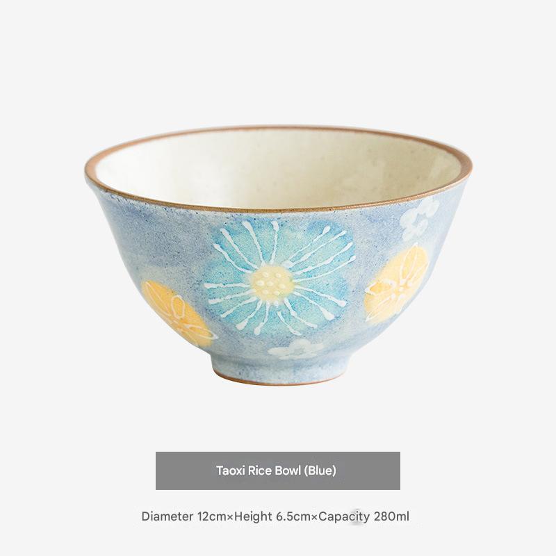 Artisan-crafted ceramic bowls arranged to highlight their intricate blossom design