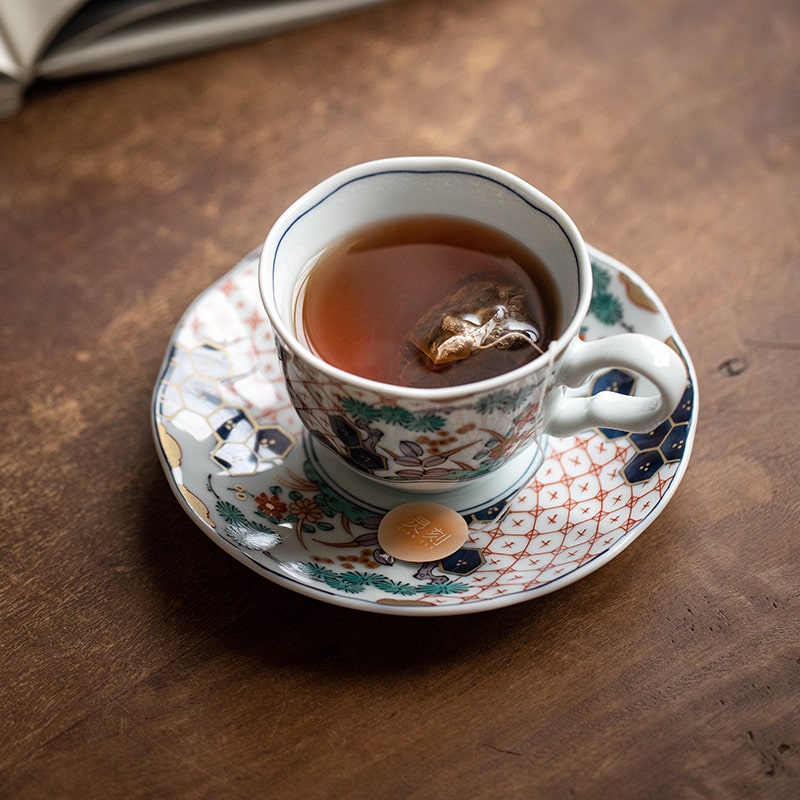 Elegant Japanese porcelain teacup with intricate pattern