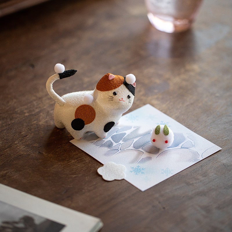 Japanese handcrafted fortune cat ornament on desk