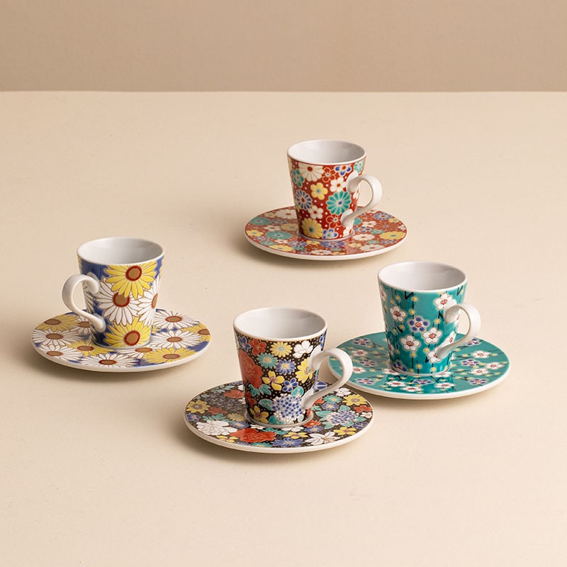 Floral espresso cup set with colorful saucers