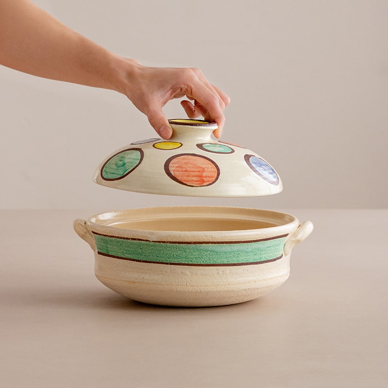 Hand-painted Japanese ceramic pot with colorful planet design