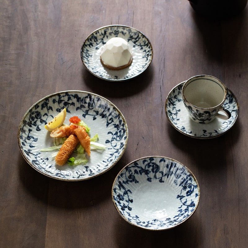 Japanese Mino glaze tableware with intricate arabesque patterns