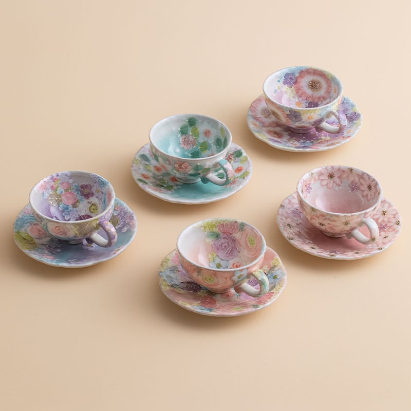 Hand-painted Japanese floral tea cup with saucer in pastel tones