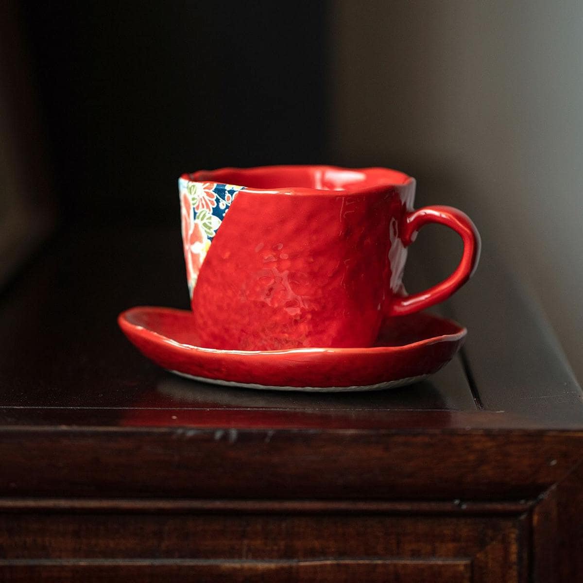 Close-up of Mino ware ceramic mug featuring floral accents