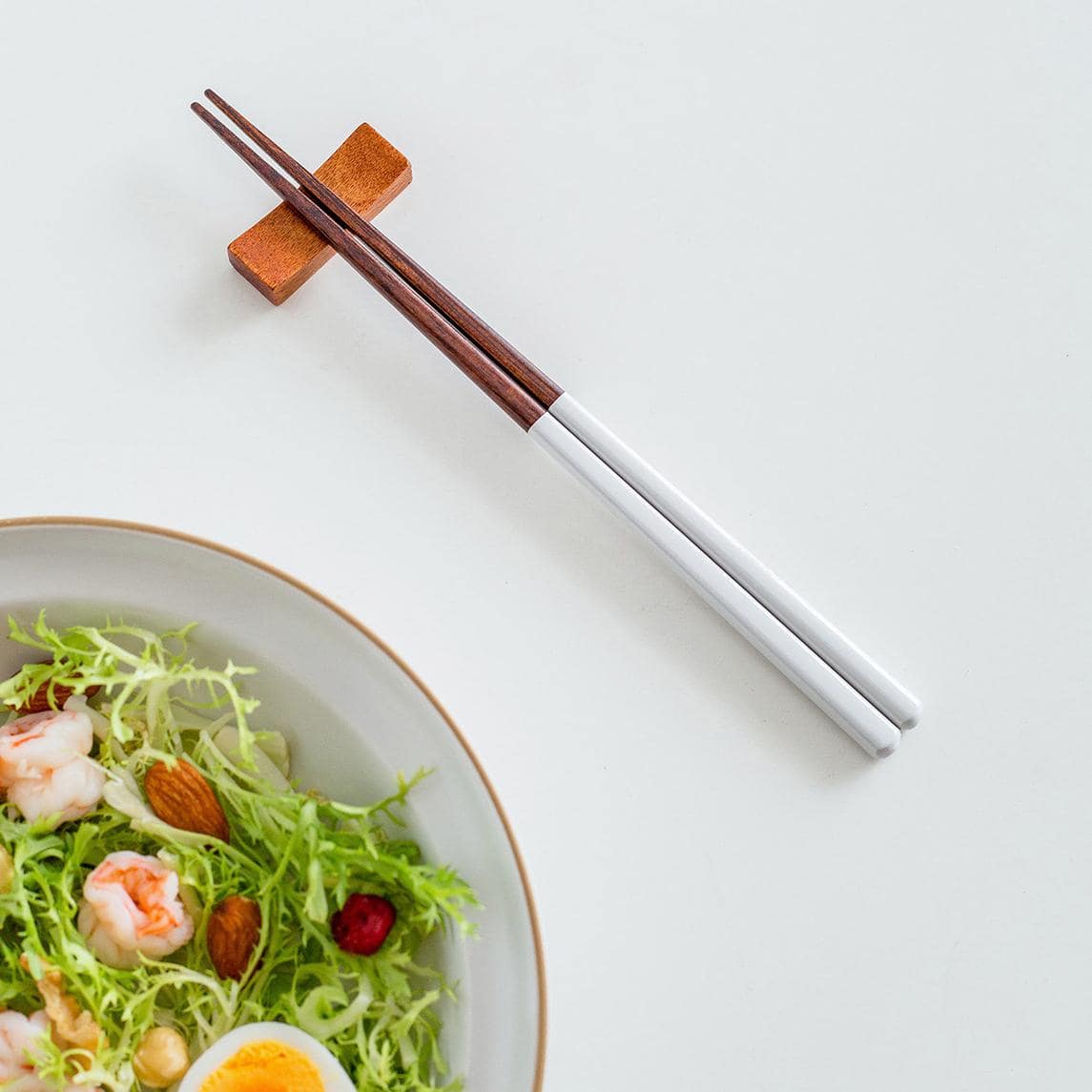 Minimalist white and brown wooden chopsticks