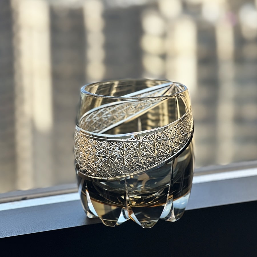 Thunder Light Edo Kiriko whiskey glass, 320mL hand-carved crystal with intricate Japanese design in a smoky tint.