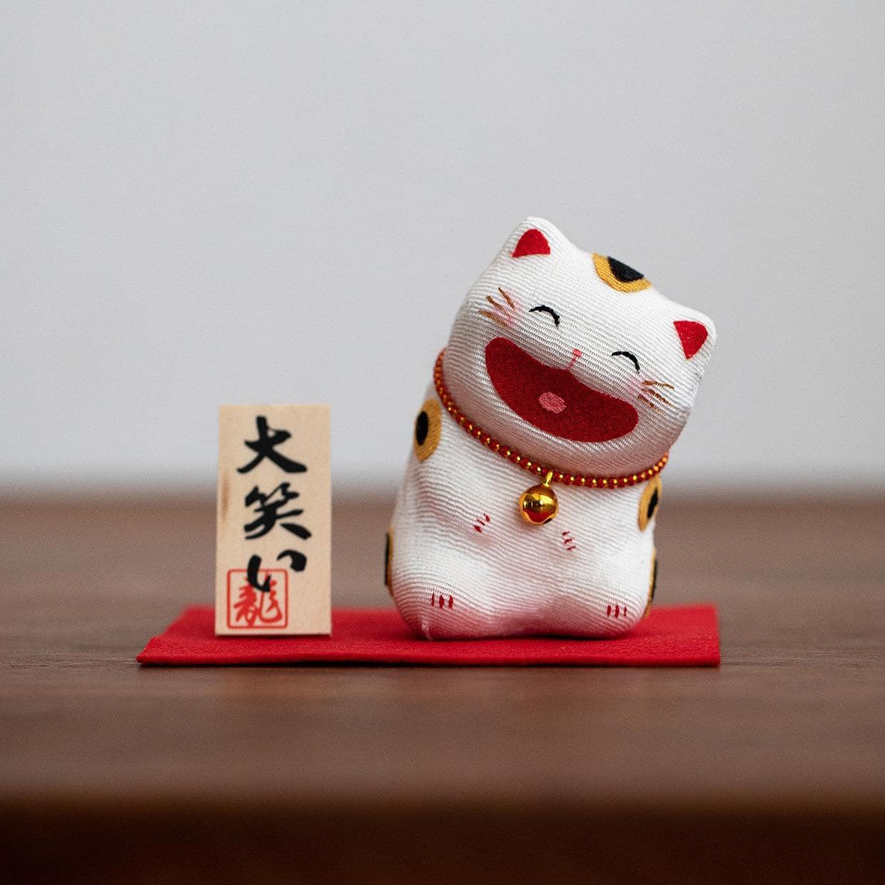 Lucky cat desk decoration bringing good luck and joy