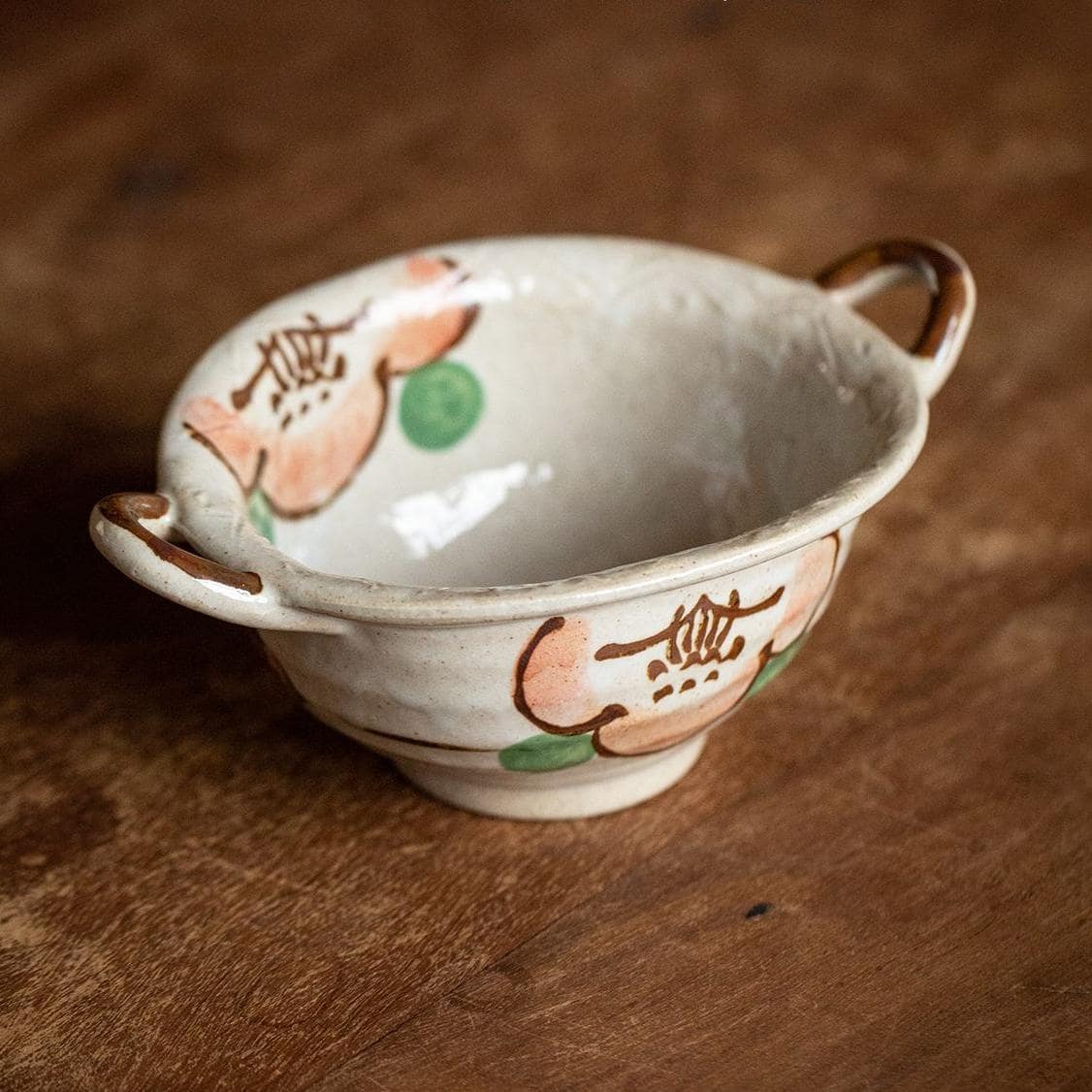 Japanese ceramic tableware set with hand-painted floral design.