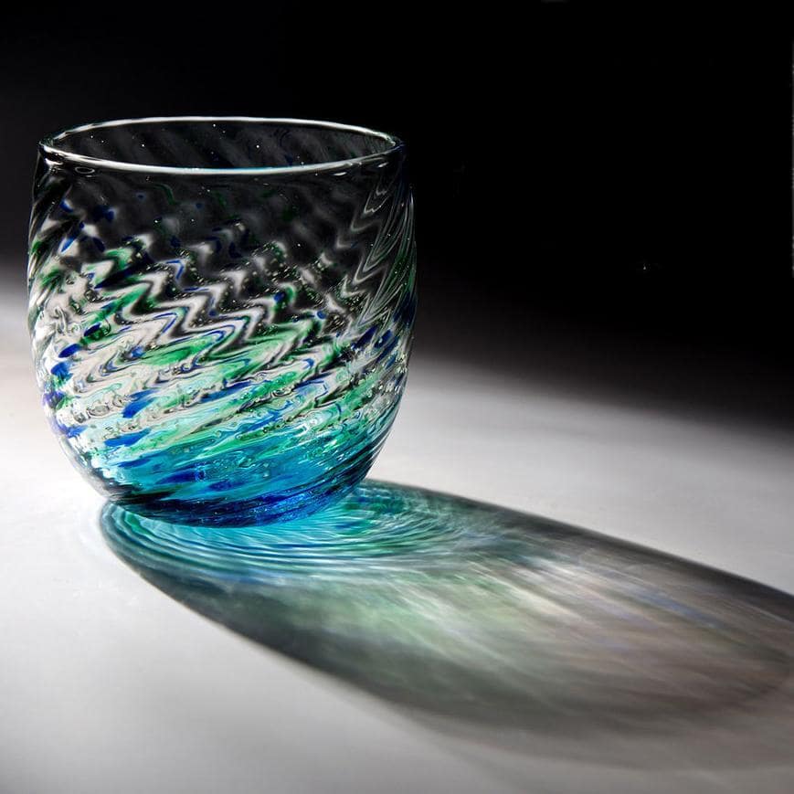 Artistic Japanese Mizuno glass glowing in low light