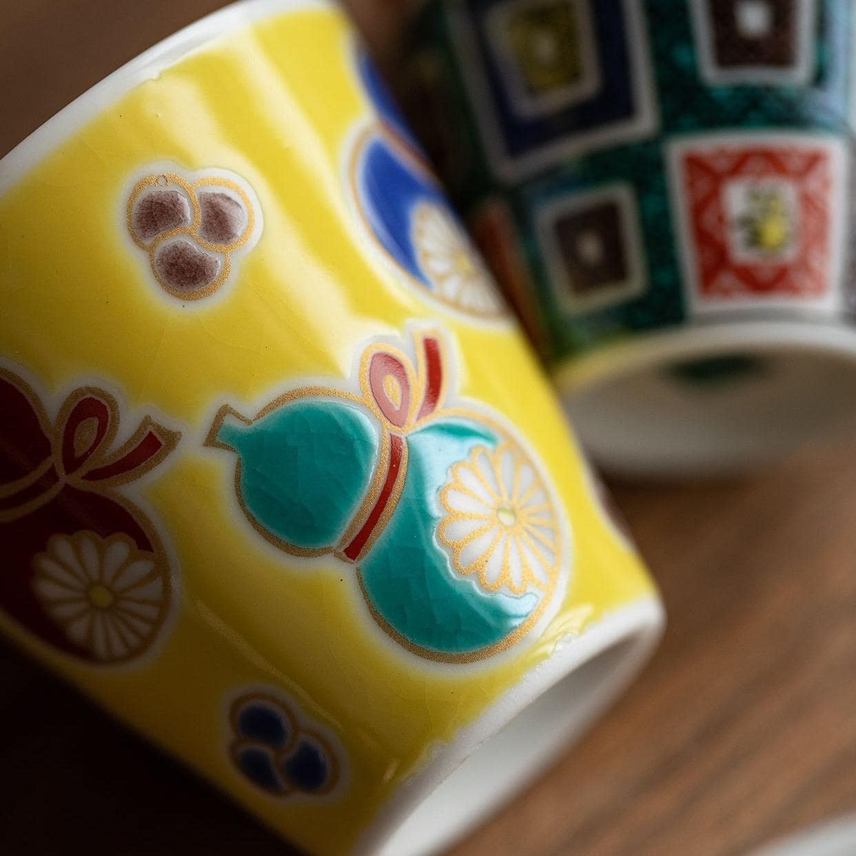 Close-up of a traditional Japanese sake cup with geometric design