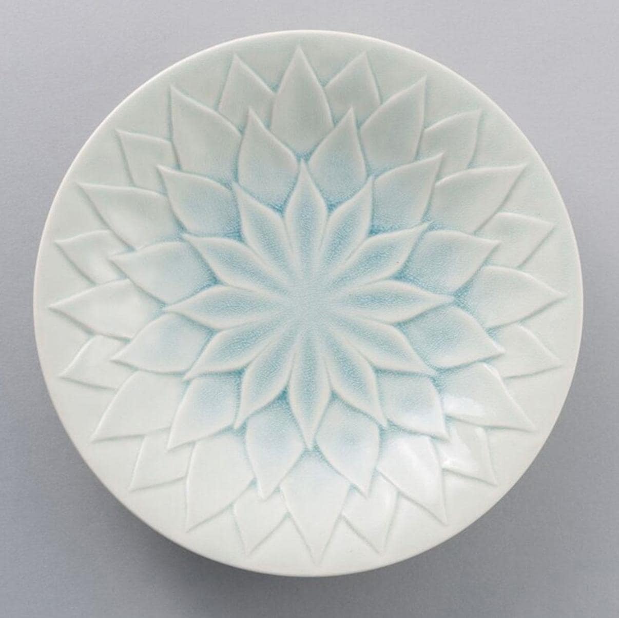 Elegant ceramic dining plate with soft pastel glaze