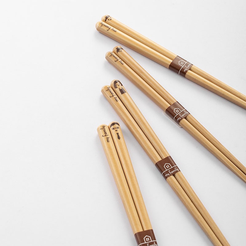 Family-themed bamboo chopsticks with unique designs.