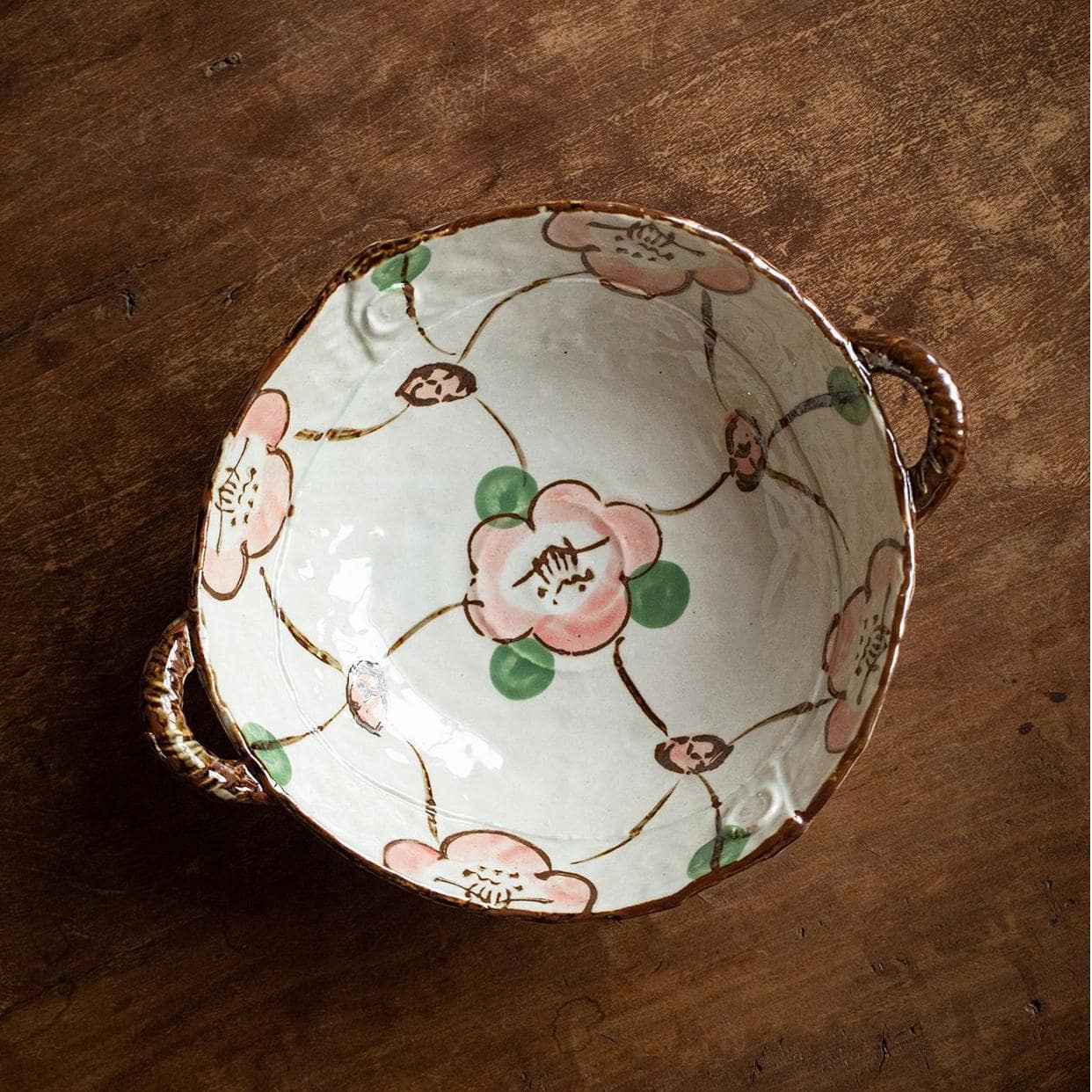 Japanese ceramic tableware set with hand-painted floral design.