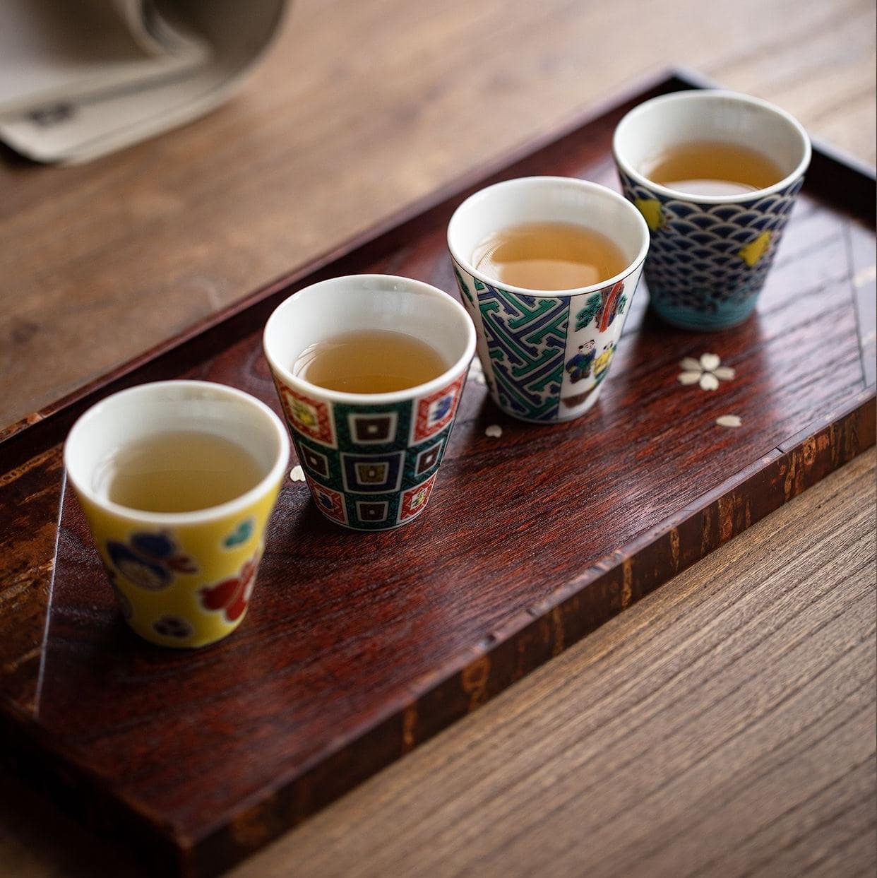 Set of Japanese porcelain cups with vibrant patterns