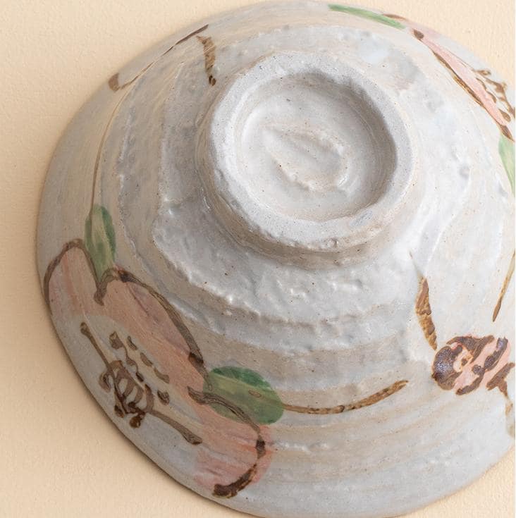 Hand-painted Japanese-style ceramic dishes for dining and serving.