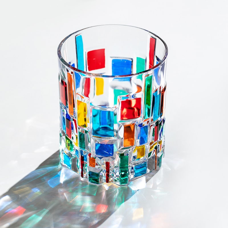 Handcrafted Murano wine glass with colorful mosaic design