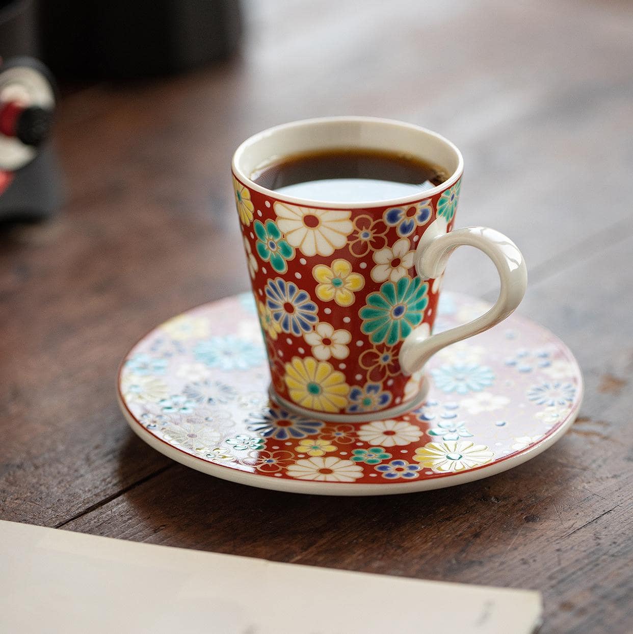 Detailed view of espresso cup set showcasing intricate patterns