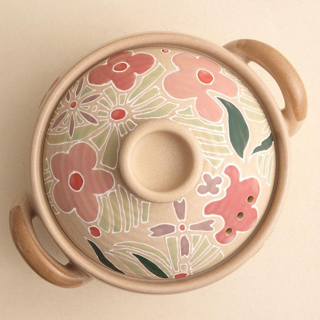 Whimsical ceramic casserole dishes perfect for slow cooking