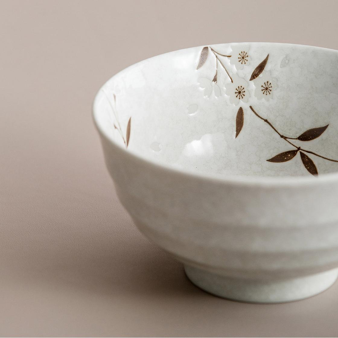 Stack of Japanese artisan ceramic bowls with unique glazes