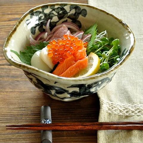 Japanese Mino glaze tableware with intricate arabesque patterns